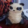 This is actually not the original ceramic panda from my childhood, the original was lost in my parent's divorce with the throwing out of many childhood things without my knowledge.  But Ebay has miraculously given him back to me, through years of searching.  