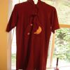 My mother made this nightgown for my sister and I. It has a hood on the back and deep pockets in the front to hide cookies in before bedtime. The material feels like velvet and it's the warmest thing ever. My sister and I would constantly steal it out of one another's rooms. I guess I won.